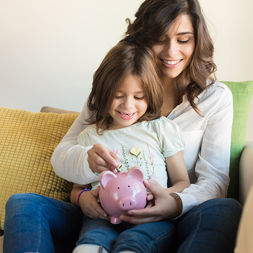 Mom and daughter saving money