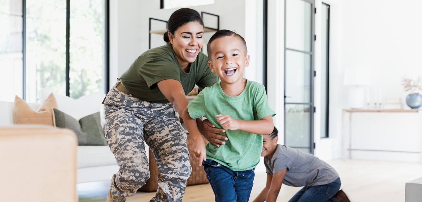 After work, female soldier chases son in house